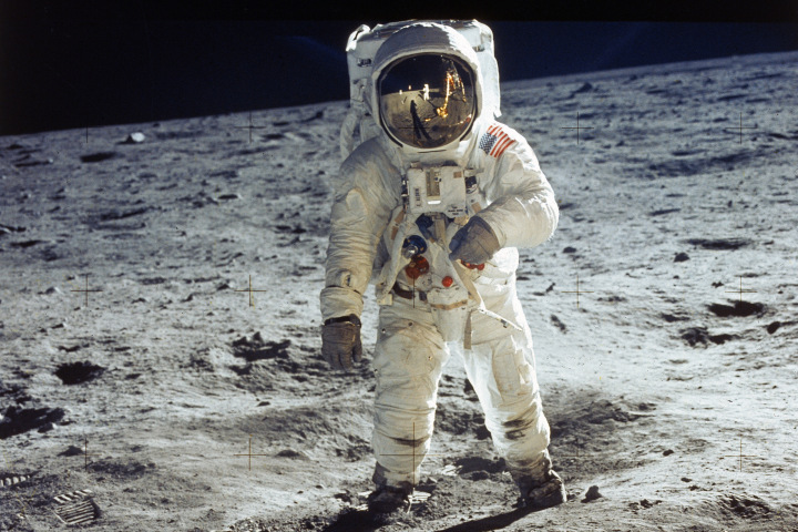 UNSPECIFIED - JULY 20:  Apollo 11 astronaut Buzz Aldrin standing on moon, with astronaut Neil Armstrong & lunar module reflected in helmet visor, during historic 1st walk on lunar surface.  (Photo by NASA/NASA/Time & Life Pictures/Getty Images)